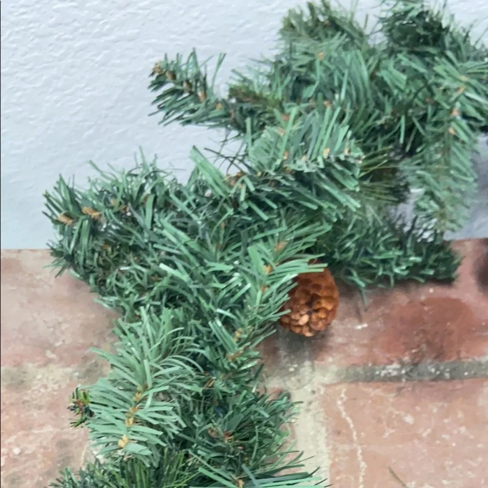 Lifelike synthetic Christmas holiday garland with pine cones 100” long